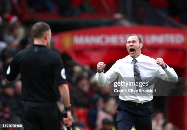 Interim Everton Manager, Duncan Ferguson celebrates after his team's first goal during the Premier League match between Manchester United and Everton...