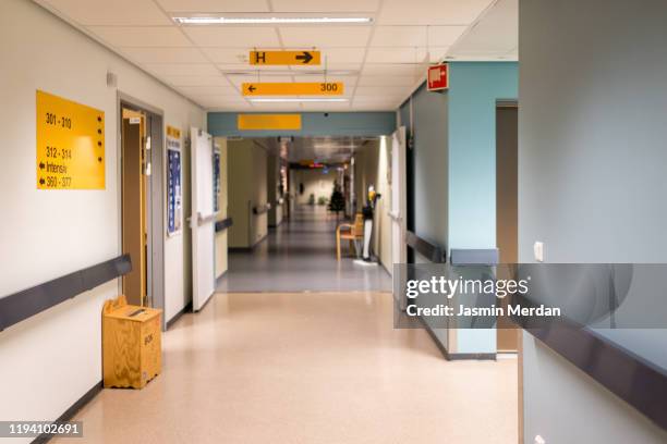 corridor in hospital - hospital sign stock pictures, royalty-free photos & images