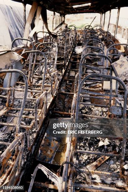 This file photo taken on August 6, 1982 in Beaune shows the wreckage of a bus in a scrapyard, six days after a road crash and blaze, that killed 53...