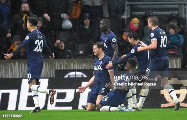 Jan Vertonghen of Tottenham Hotspur celebrates with teammates after scoring his team's second goal during the Premier League match between...