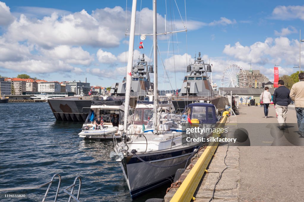 Skjold class corvettes of Royal Norwegian Navy in Bergen harbor on sunny day in spring