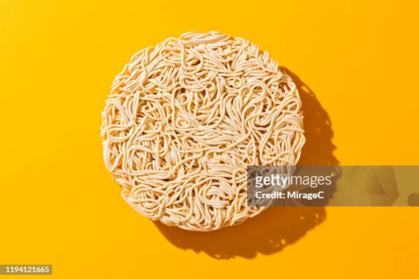 dry uncooked instant noodles - ramen noodles stock pictures, royalty-free photos & images