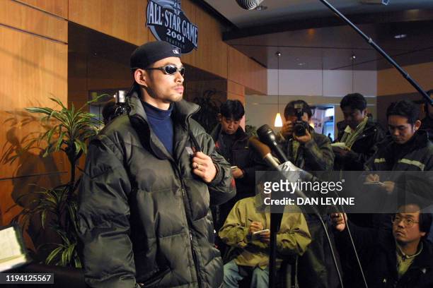 Japanese baseball sensation and newly signed Seattle Mariner Ichiro Suzuki holds a press conference at Safecon Field after a workout 11 January 2001...
