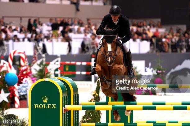 Kevin Staut of France rides Viking d'la Rousserie during the Rolex Grand Prix, part of the Rolex Grand Slam of Show Jumping at CHI de Geneve, at...