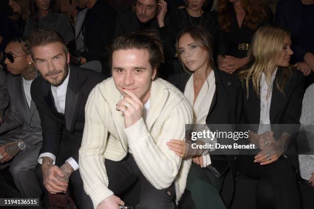 David Beckham, Brooklyn Beckham, Victoria Beckham and Kate Moss attend the Dior Homme Menswear Fall/Winter 2020-2021 show as part of Paris Fashion...