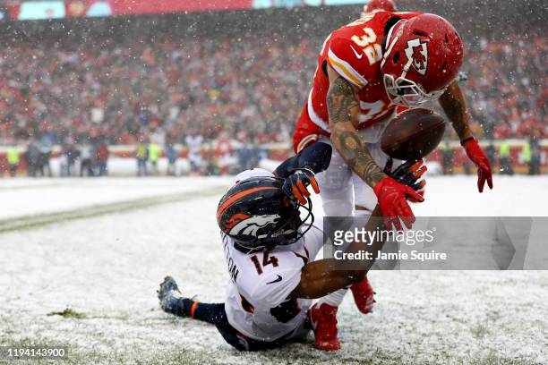 Tyrann Mathieu of the Kansas City Chiefs breaks up a pass intended for Courtland Sutton of the Denver Broncos in the game at Arrowhead Stadium on...