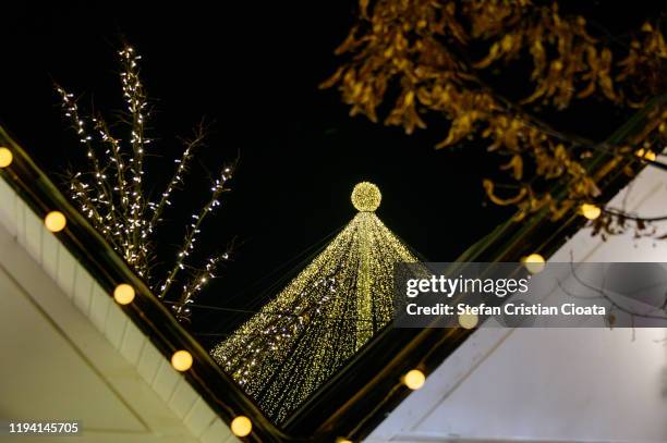 white houses in christmas market cluj - cluj-napoca romania stock pictures, royalty-free photos & images