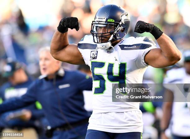 Bobby Wagner of the Seattle Seahawks reacts after a touchdown against the Carolina Panthers during the fourth quarter of their game at Bank of...