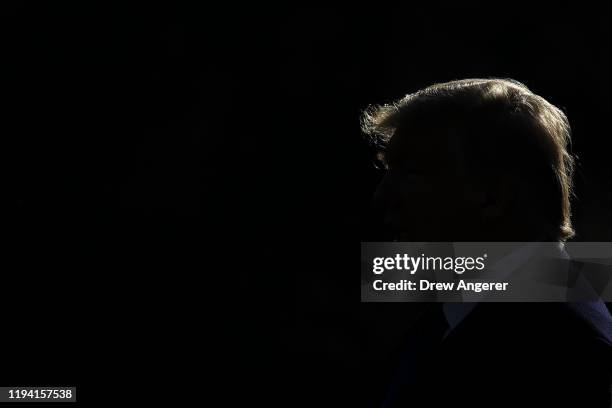 President Donald Trump walks across the South Lawn toward Marine One at the White House on January 17, 2020 in Washington, DC. The Trump family is...