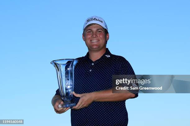 Co-medalist Braden Thornberry poses with the trophy following the Korn Ferry Tour Q-School Tournament Finals at Orange County National Golf Club...