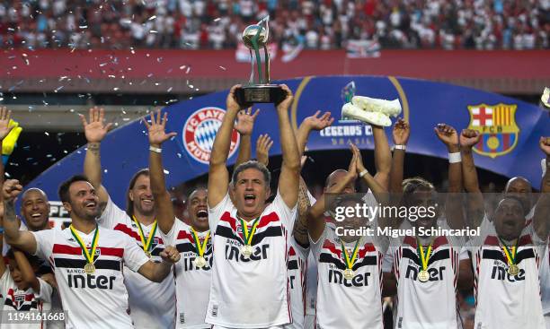 Careca of Sao Paulo FC holds the trophy after winning Legends Cup 2019 final between Sao Paulo FC and Barcelona at Morumbi Stadium on December 15,...