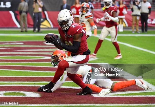 Patrick Peterson of the Arizona Cardinals makes an interception in the endzone on a pass that was intended for Odell Beckham Jr of the Cleveland...