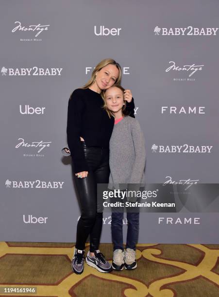 Jen Meyer and Otis Tobias Maguire attend The Baby2Baby Holiday Party Presented By FRAME And Uber at Montage Beverly Hills on December 15, 2019 in...