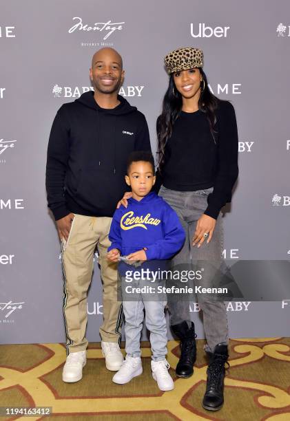 Tim Weatherspoon, Titan Jewell Weatherspoon and Kelly Rowland attend The Baby2Baby Holiday Party Presented By FRAME And Uber at Montage Beverly Hills...