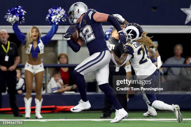 Jason Witten of the Dallas Cowboys scores a touchdown against Marqui Christian of the Los Angeles Rams in the first half at AT&T Stadium on December...