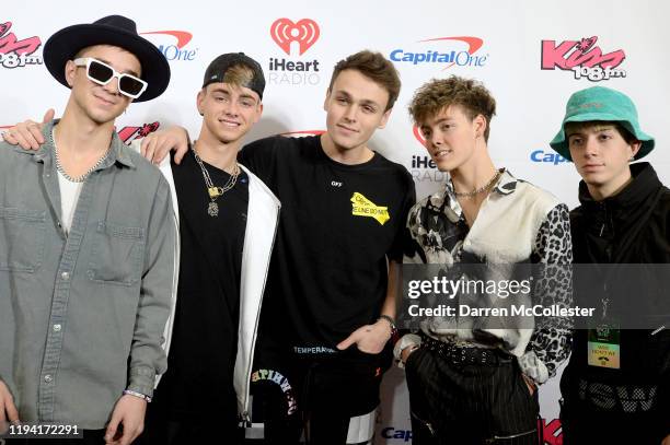 Daniel Seavey, Corbyn Besson, Jonah Marais, Zach Herron, and Jack Avery of Why Don't We arrive at KISS 108's iHeartRadio Jingle Ball 2019 on December...