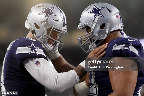 Dak Prescott of the Dallas Cowboys celebrates with La'el Collins of the Dallas Cowboys after the Dallas Cowboys scored a touchdown against the Los...