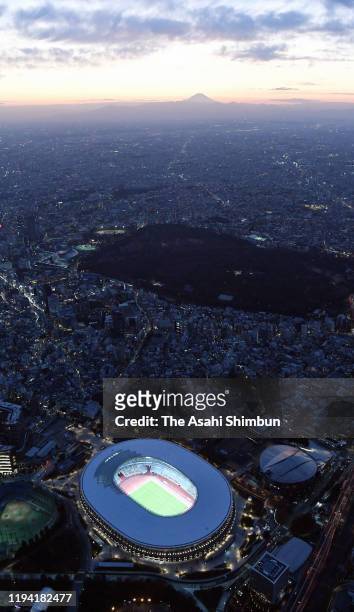In this aerial image, a general view of the new National Stadium with the Mt. Fuji is seen on the background on December 15, 2019 in Tokyo, Japan.