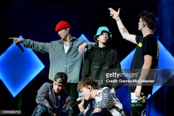 Daniel Seavey, Jack Avery, Corbyn Besson, Zach Herron, and Jonah Marais of Why Don't We perform onstage during KISS 108's iHeartRadio Jingle Ball...