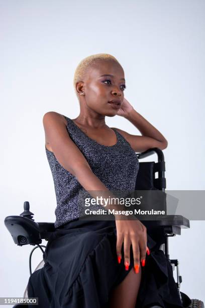 Beauty portraits of a confident woman on a wheelchair