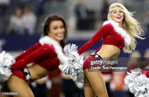 The Dallas Cowboys Cheerleaders perform as the Dallas Cowboys take on the Los Angeles Rams at AT&T Stadium on December 15, 2019 in Arlington, Texas.