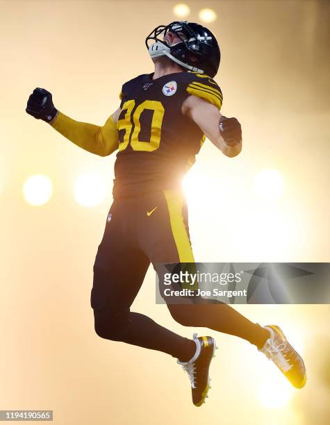 Watt of the Pittsburgh Steelers jumps in the air as he runs onto the field before the game against the Buffalo Bills at Heinz Field on December 15,...