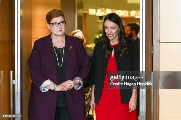 New Zealand Prime Minister Jacinda Ardern speaks to Australian Foreign Affairs Minister Marise Payne prior to a meeting at Parliament on December 16,...