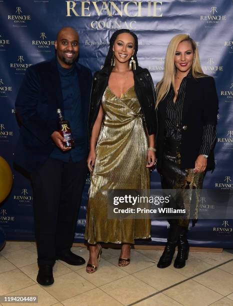 Layne, Keri Hilson and Nikki Chu attend Keri Hilson Private Birthday Dinner at Agency Phipps Plaza on December 12, 2019 in Atlanta, Georgia.