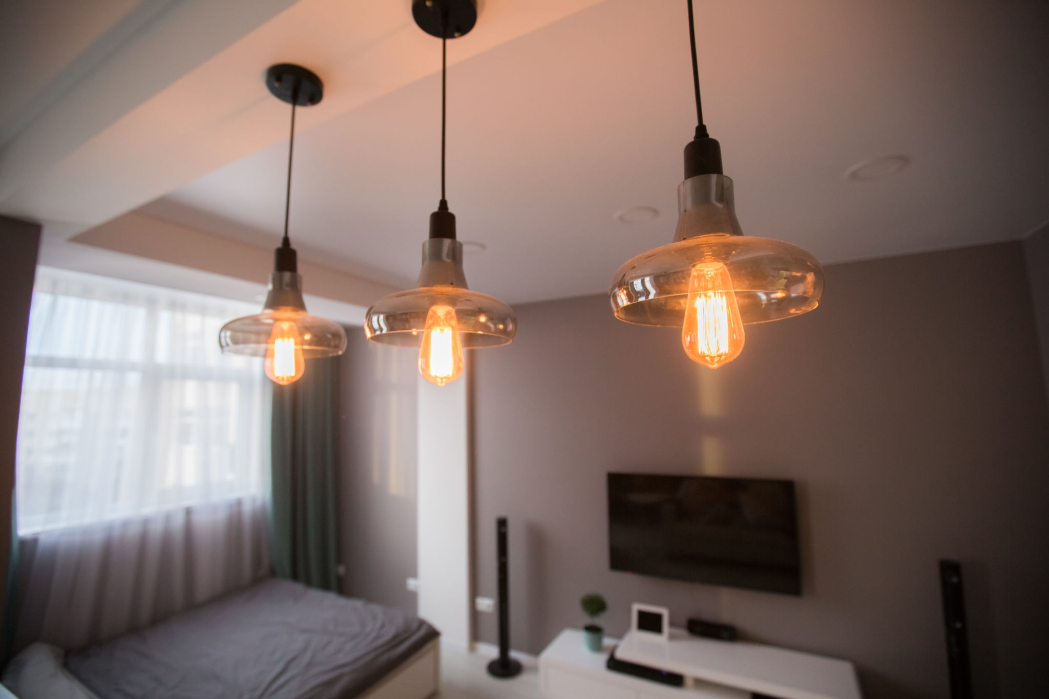 The interior of a compact smart apartment with walls divided into areas for work and recreation The interior of a compact smart apartment with walls divided into areas for work and recreation