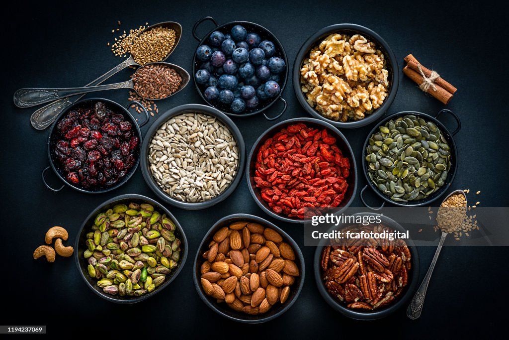 Healthy eating: assortment of nuts, seeds and fruits. Top view.