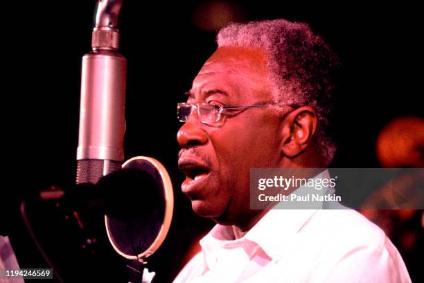 American Jazz and Blues singer Joe Williams performs onstage at George's Nightclub, Chicago, Illinois, April 18, 1989.