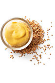 Seasoning: Mustard and Mustard Seeds Isolated on White Background