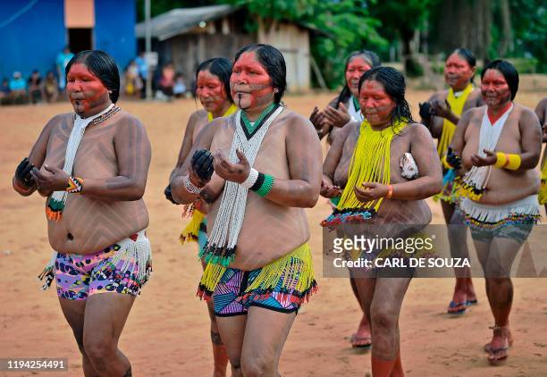 Indigenous women of the Kayapo tribe perform a ceremonial after a speech by their indigenous leader Cacique Raoni Metuktire, in Piaracu village, near...