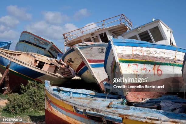 The abandoned remains of migrant boats on October 20,2019 in Lampedusa,Italy. Lampedusa the Southern most point of Italy stretching towards North...