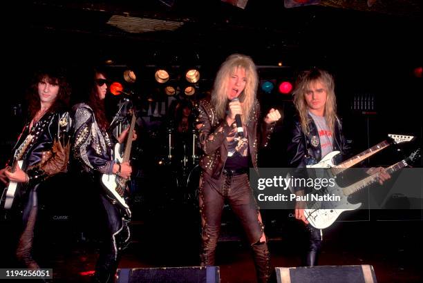 Members of American Rock group Warrant perform onstage at the Thirsty Whale, Rosemont, Illinois, March 5, 1989. Pictured are, from left, Erik Turner,...