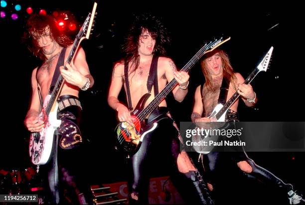 Members of American Rock group Warrant perform onstage at the Rosemont Horizon, Rosemont, Illinois, November 5, 1989. Pictured are, from left, Erik...