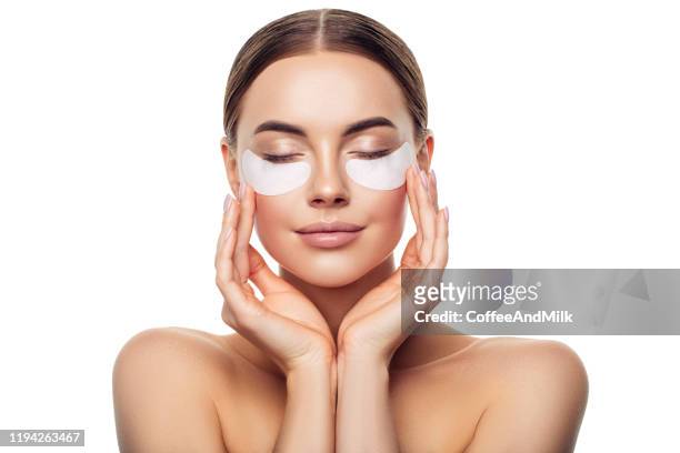 woman with eye patches under her eyes - one eyed stock pictures, royalty-free photos & images