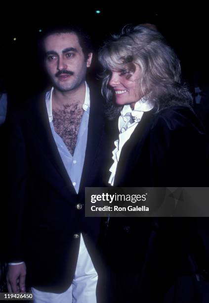 Businessman Dodi Al-Fayed and actress Cathy Lee Crosby attend the premiere party for "Chariots Of Fire" on April 8, 1982 at the Bistro in Beverly...