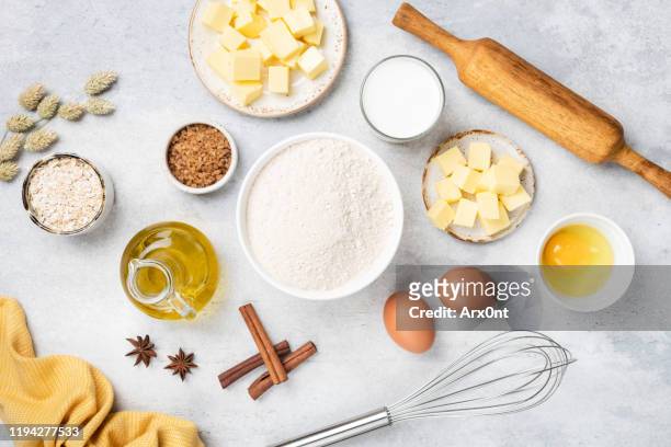 ingredients for baking on white table - ingredients on white ストックフォトと画像