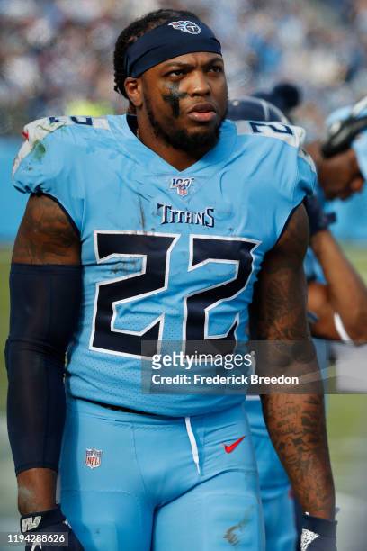 Derrick Henry of the Tennessee Titans watches from the sideline during a game against the Houston Texans at Nissan Stadium on December 15, 2019 in...