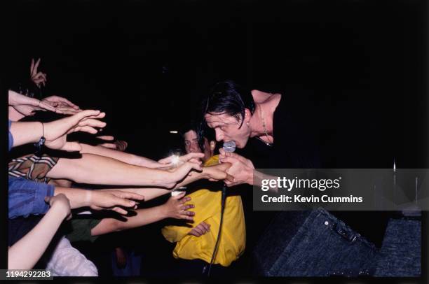 British singer Brett Anderson of rock band Suede performing live, circa 1993.