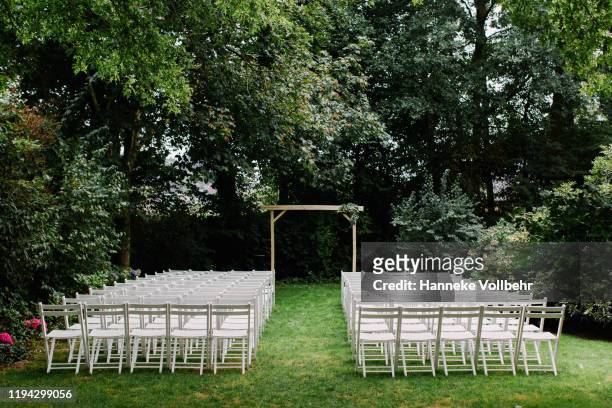 white chairs lined up for wedding ceremony - ceremony bildbanksfoton och bilder