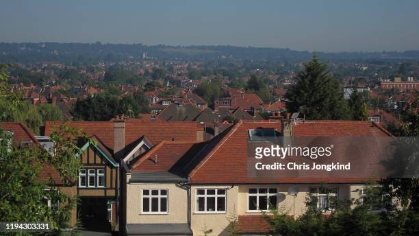 houses in suburbia with green hills in distance - harrow london stock pictures, royalty-free photos & images