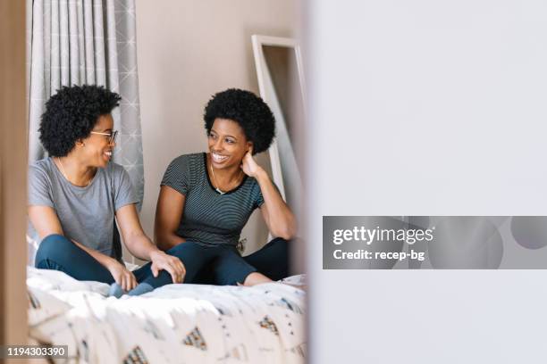 216 Identical Twins Talking Stock Photos, High-Res Pictures, and