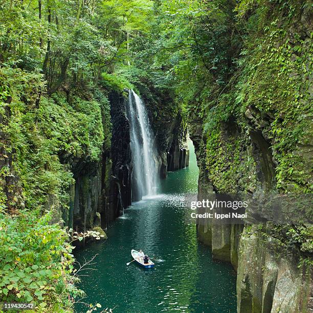 waterfall in volcanic gorge river, kyushu, japan - kyushu stock-fotos und bilder