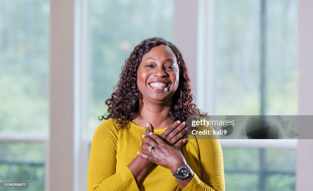 Mature African-American woman, smiling