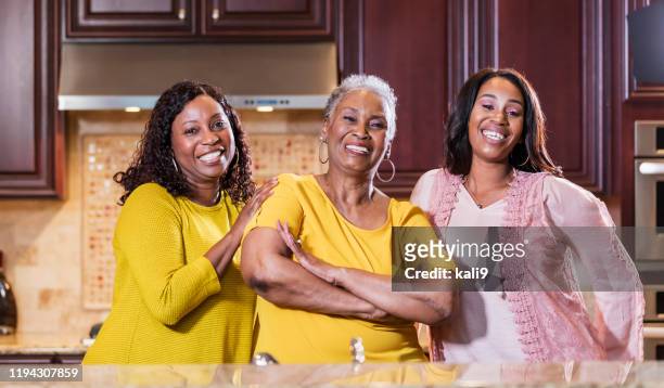 three generations, african-american women - 3 women senior kitchen stock pictures, royalty-free photos & images