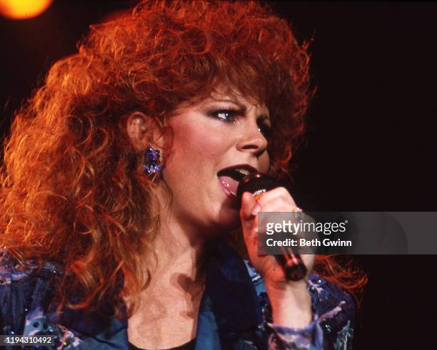 Country Music Singer Songwriter Reba McEntire preforms on August 24, 1990 Nashville, Tennessee