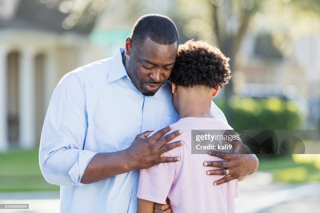 Conoling Father Consoling His Teenage Son High-Res Stock Photo - Getty Images