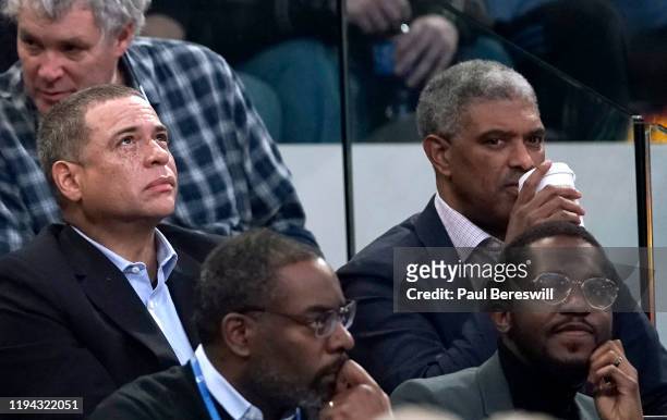 New York Knicks General Manager Scott Perry and President Steve Mills watch the game in their seats at an NBA basketball game between the Knicks and...